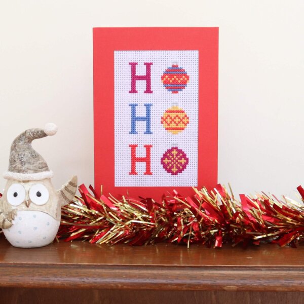 Ho Ho Ho Christmas Baubles Cross-stitch Card Kit. Red aperture card.